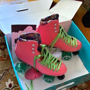 Pink Roller Skates with Green Laces
